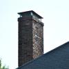Chimney rebuild complete, near perfect match on brick/motar. Stainless steel chimney cap installed.