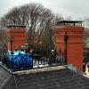 Chimneys with new stainless steel caps in place.